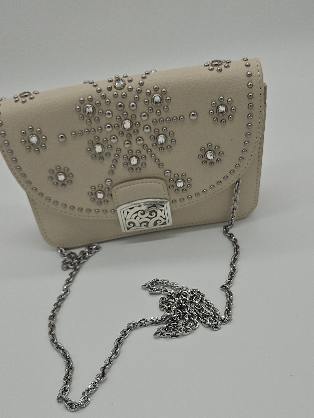 Stud-Embellished Cream Crossbody Bag with Decorative Chain